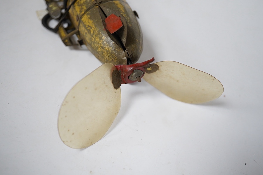 An early 20th century Lehmann tinplate clockwork EPL-1 zeppelin, 651, with rotating propellers to the rear. Condition - poor to fair, considerable losses to paint work, however clockwork motor still has some strength.